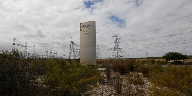 Pylons carry electricity from a sub-station of state power utility Eskom outside Cape Town in this picture taken March 20, 2016. REUTERS/Mike Hutchings