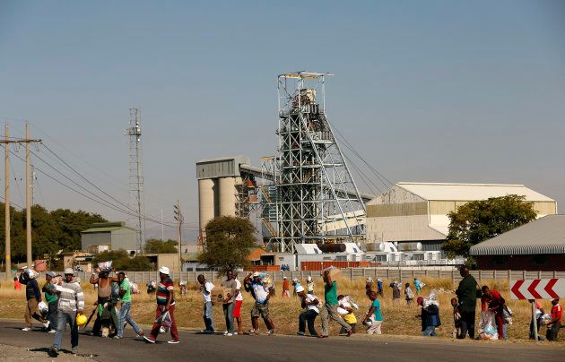 Members of the mining community at the Khomanani mine in Rustenburg May 28, 2014. REUTERS/Siphiwe Sibeko