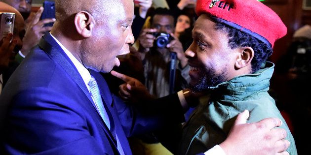 JOHANNESBURG, SOUTH AFRICA â AUGUST 22: Newly elected City of Johannesburg Mayor Herman Mashaba celebrates with Mbuyiseni Ndlozi during an inaugural council meeting on August 22, 2016 in Johannesburg, South Africa. Mashaba received 144 votes, while ANCâs Parks Tau received 125 votes. (Photo by Gallo Images / Daily Sun / Trevor Kunene)