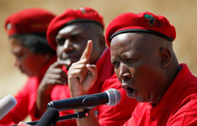 Julius Malema, leader of South Africa's Economic Freedom Fighters (EFF), gestures during a media briefing in Alexandra township near Sandton, South Africa August 17, 2016. REUTERS/Siphiwe Sibeko