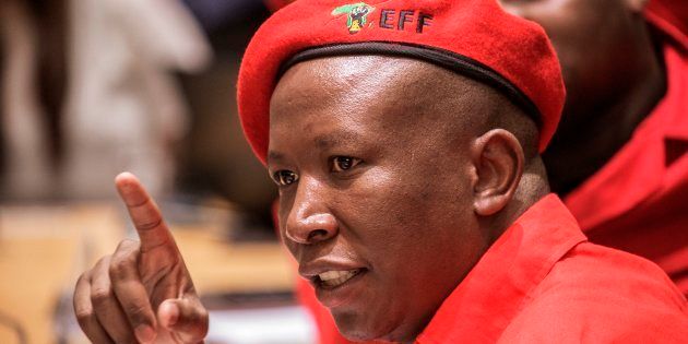 South African opposition party Economic Freedom Fighters (EFF) leader Julius Malema gestures as he delivers a speech during a press conference on February 15, 2018 in Cape Town, South Africa.