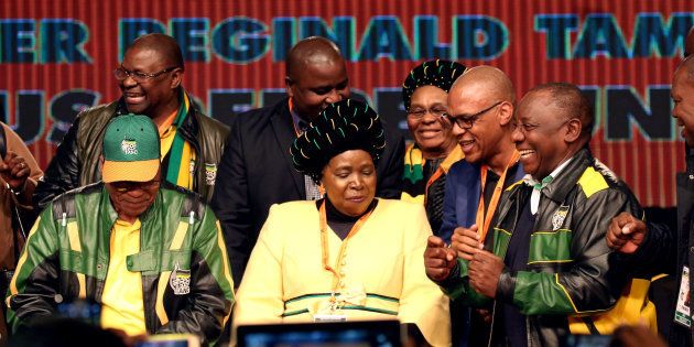 South Africa's President Jacob Zuma dances with former African Union chairperson Nkosazana Dlamini-Zuma and South Africa's Deputy President Cyril Ramaphosa during the last day of the six-day meeting of the African National Congress 5th National Policy Conference.