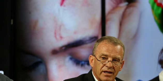 Advocate Gerrie Nel addresses a news conference with Gabriella Engels, who claims to have been assaulted by Grace Mugabe, in Pretoria this month.REUTERS/Siphiwe Sibeko