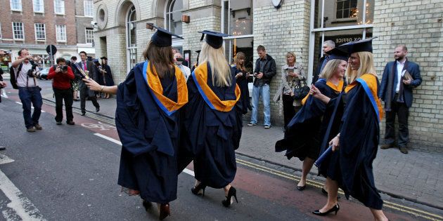 A general view of students wearing Mortar Boards and Gowns after graduating from Anglia Ruskin University in Cambridge.