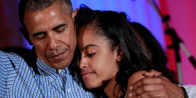 U.S. President Barack Obama congratulates his daughter Malia on her birthday during the Independence Day celebration at the White House in Washington U.S., July 4, 2016.