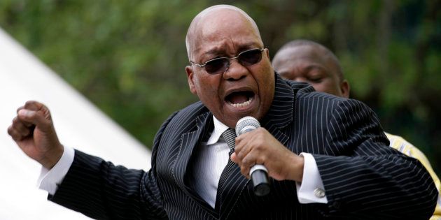 Jacob Zuma sings and dances after appearing in the High Court in Durban, April 7, 2009.