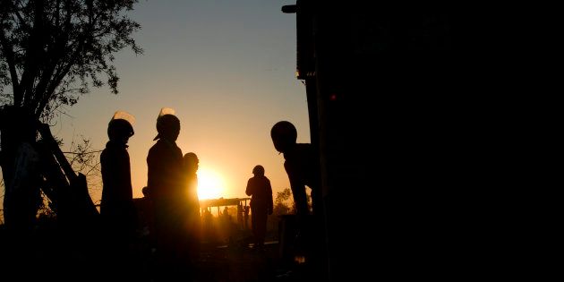 Red Ants evict shack dwellers from an illegal informal settlement near Hoerskool Wagpos on August 15, 2016 in Brits, South Africa.