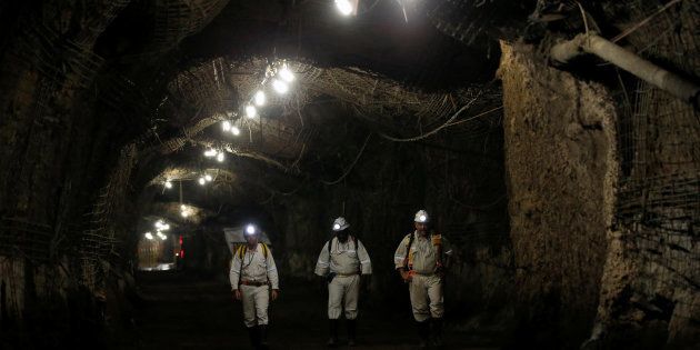 Workers are seen underground South Africa's Gold Fields South Deep mine in Westonaria, 45 kilometres south-west of Johannesburg, South Africa, March 9, 2017. Picture taken March 9, 2017. REUTERS/Siphiwe Sibeko