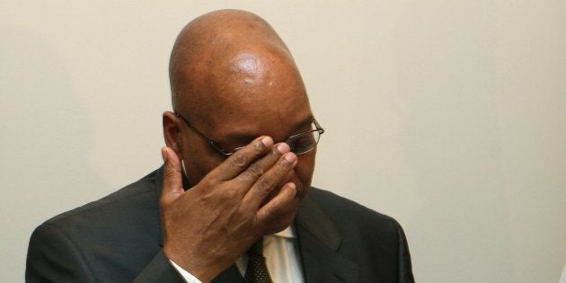 CAPE TOWN, SOUTH AFRICA - 9 March 2010: Well known Western Cape victims of crime accompanied the Solidarity trade union to Parliament on Tuesday, 9 March 2010 to present about 136,000 anti-crime letters to President Jacob Zuma. President Zuma reading one of the letters.