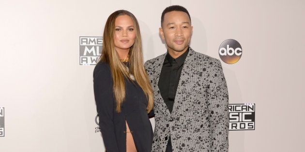 Chrissy Teigen and John Legend arrive at the 2016 American Music Awards at Microsoft Theater on November 20, 2016 in Los Angeles, California.