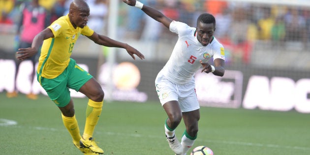 POLOKWANE, SOUTH AFRICA - NOVEMBER 12: Hlompho Kekana of South Africa and Idrissa Gueye of Senegal during the 2018 FIFA World Cup Qualifier match between South Africa and Senegal at Peter Mokaba Stadium on November 12, 2016 in Polokwane, South Africa.