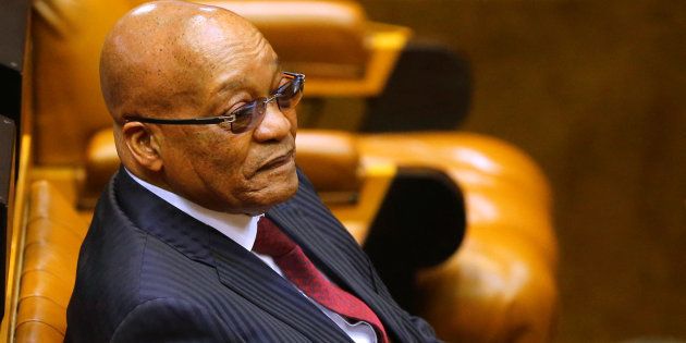 President Jacob Zuma looks on as members of Julius Malema's Economic Freedom Fighters (EFF) party raise objections before being evicted from Parliament in Cape Town, South Africa May 17, 2016.