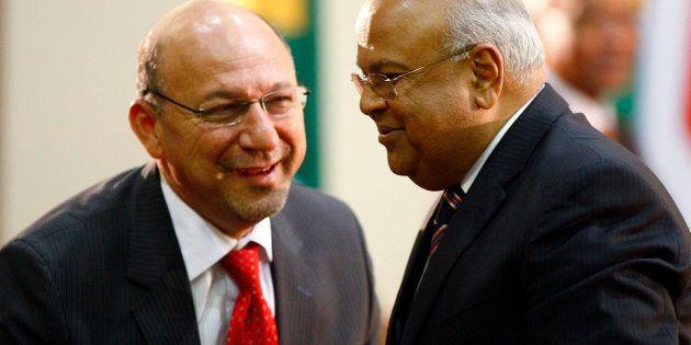 Pravin Gordhan (R) talks with Trevor Manuel. Photo: REUTERS/Siphiwe Sibeko