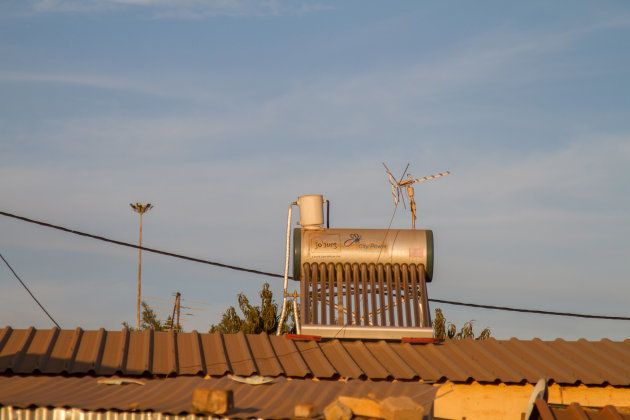 A solar water heater, manufactured by Jhb City Power, on the rooftop of a residential property in Soweto.