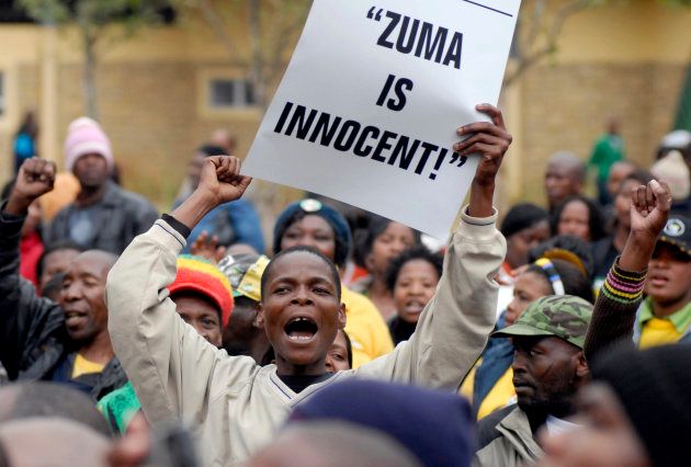 Supporters of Jacob Zuma celebrate outside the High Court in Pietermaritzburg, after charges of corruption against him were dismissed. September 12, 2008.