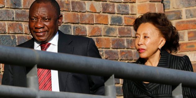 South African Deputy President Cyril Ramaphosa (L) arrives with his wife Dr Tshepo Motsepe at the Farlam Commission, in Centurion, outside Pretoria August 11, 2014.