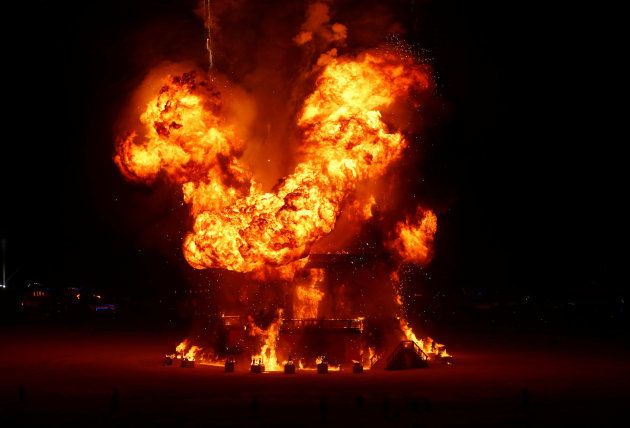 The Man is engulfed in flames at Burning Man festival.