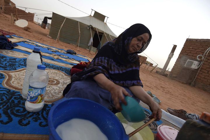 A Sahrawi refugee prepares food at the Sahrawi refugee camp of Dakhla, 170 kms to the southeast of the Algerian city of Tindouf, in the disputed territory of Western Sahara, on July 8, 2016.