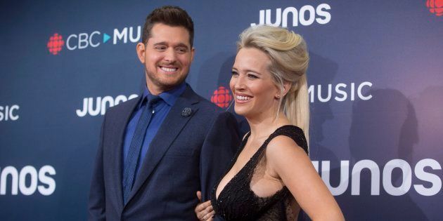 Michael Buble and wife Luisana Lopilato arrive on the red carpet at the Juno Awards in Vancouver, Sunday.