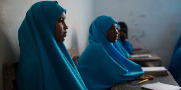 Fatima, 12, attends Arabic classes at Imran Binu Hussein Primary School in the Hodan district, Mogadishu in this September 8, 2013 handout photo provided by the United Nations Children's Fund (UNICEF). The Somali government in partnership with UNICEF launched on Sunday the "Go 2 School" initiative, which aims to get one million Somali children back to school.