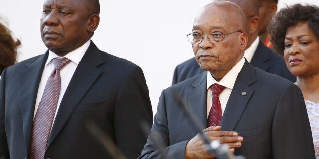 South Africa's then-Deputy President Cyril Ramaphosa and then-President Jacob Zuma stand before the state of the nation address at the opening of Parliament in Cape Town, February 11, 2016.