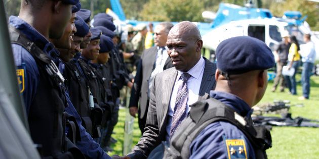 South African police chief Bheki Cele shakes hands with members of police during their presentation of readiness for the 2010 FIFA Soccer World Cup in Johannesburg, April 16, 2010.