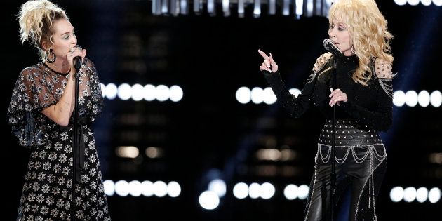 THE VOICE -- 'Live Top 10' Episode 1116B -- Pictured: (l-r) Miley Cyrus, Dolly Parton -- (Photo by: Tyler Golden/NBC/NBCU Photo Bank via Getty Images)