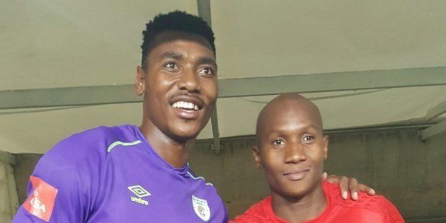 Baroka FC goalkeeper Oscarine Masuluke, with Orlando Pirates FC goalkeeper Jackson Mabokgwane after the drawn match.