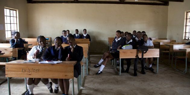 A 12th grade class at Khabazela High School pose for a picture in their classroom in eMbo, west of Durban, South Africa, September 23, 2015.