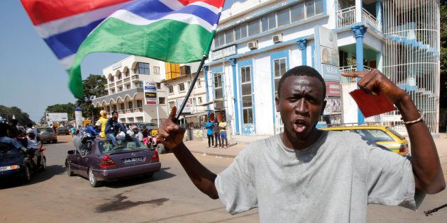 Supporters of president-elect Adama Barrow celebrate Barrow's election victory in Banjul, Gambia.