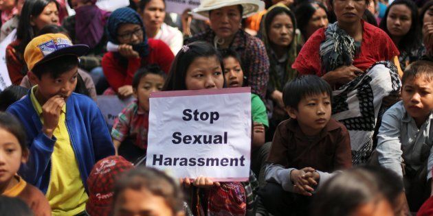 Myanmarese refugees participate in a protest on International Women's Day in New Delhi, India Saturday, March 8, 2014. Myanmarese in Delhi alleged their government used forms of violence against women as weapons of war and demanded an end to it. They also urged India for protection from sexual violence, healthcare and education for their children in India.