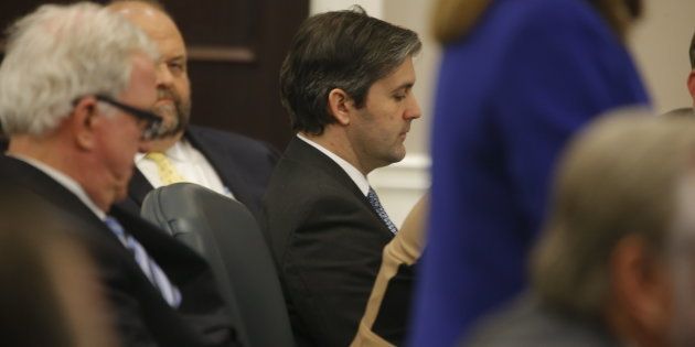 North Charleston police officer Michael Slager, center, sits in the courtroom during his murder trial at the Charleston County court in Charleston, S.C., Friday, Dec. 2, 2016, in Charleston, S.C. Circuit Judge Clifton Newman told the jurors Friday afternoon that they should try again to reach a verdict in the trial of former South Carolina patrolman Michael Slager. Slager is accused of shooting and killing Walter Scott, an unarmed black man during a traffic stop in April 2015.