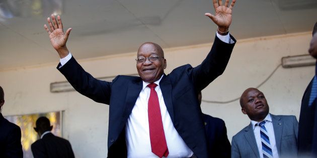 Jacob Zuma, former president of South Africa, waves to his supporters on his way to the high court in Durban. April 6, 2018.