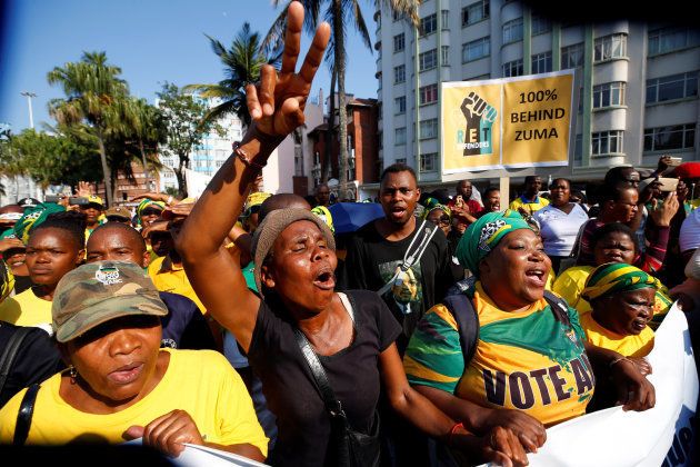 Supporters of Jacob Zuma wait outside the high court in Durban