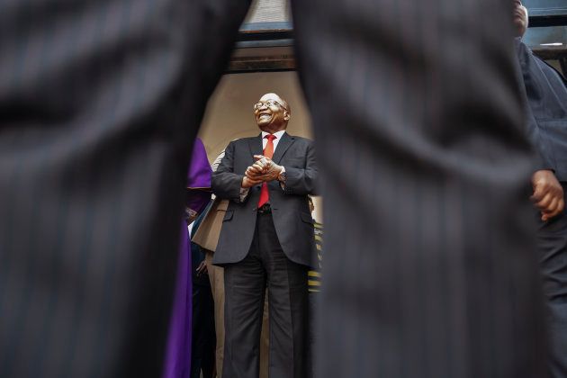 Jacob Zuma greets a crowd of supporters before addressing them outside the KwaZulu-Natal High Court in Durban.