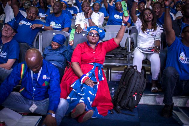 South African opposition party, Democratic Alliance (DA) member votes during the policy decision session at the Federal Congress in Pretoria on April 08, 2018. / AFP PHOTO / GULSHAN KHAN (Photo credit should read GULSHAN KHAN/AFP/Getty Images)