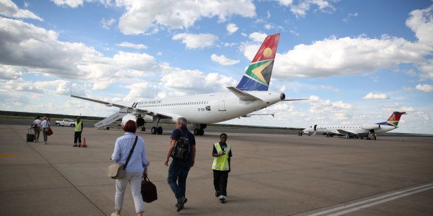 Passengers board an SAA aircraft at the Hosea Kutako International Airport outside Windhoek in Namibia.