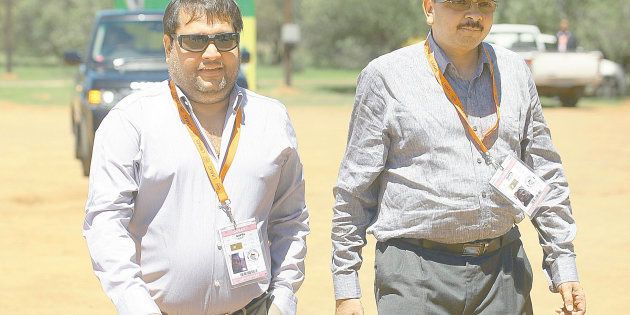 Brothers Ajay and Rajesh Gupta arrive as VIP guests at the ANC conference on December 17 2012 in Bloemfontein, South Africa.