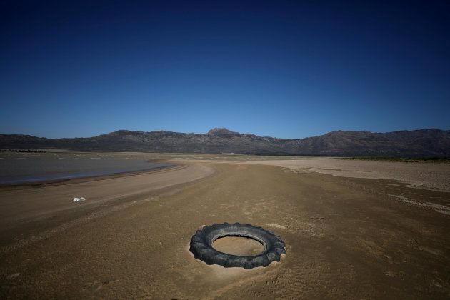 Debris is seen as water levels fall to about 24 percent full at Voelvlei Dam, one of the region's largest water catchment dams, near Cape Town, South Africa December 5, 2017. Picture taken December 5, 2017.