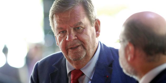 Billlionaire Johann Rupert, founder and chairperson of Compagnie Financière Richemont SA, speaks with delegates during the Business of Luxury summit in Monaco, on Monday, June 8, 2015.