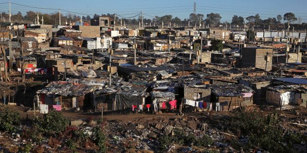 A general view shows Alexandra township, an informal settlement for thousands of South Africans who lack the means to get a proper home, located near the upper-class suburb of Sandton in Johannesburg,.