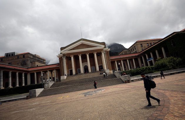 Students walk accross a plaza in front of the University of Cape Town in Cape Town, South Africa, November 13, 2017.