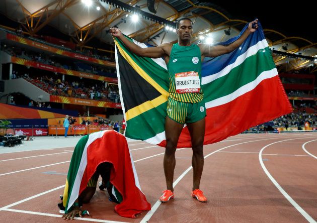 Gold medalist Akani Simbine of South Africa and silver medalist Henricho Bruintjies of South Africa. REUTERS/Paul Childs