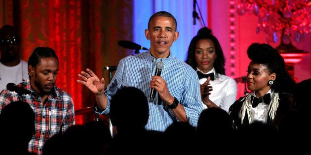 U.S. President Barack Obama speaks between Janelle Monae (R) and Kendrick Lamar (L) during the Independence Day celebration at the White House in Washington U.S., July 4, 2016.