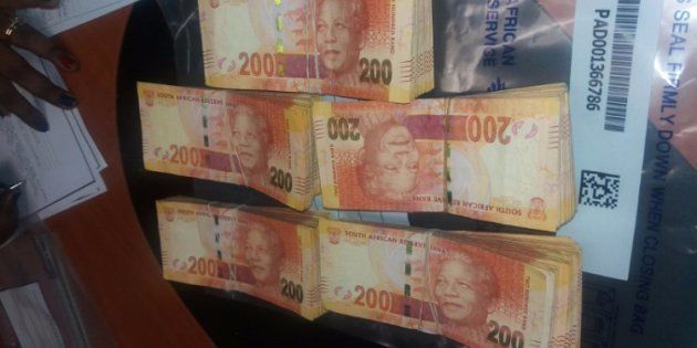 A large sum of money was found at the house where four people were arrested for alleged drug dealing. Picture: KZN SAPS