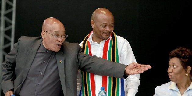 President Jacob Zuma (L) gestures next to former Kwazulu-Natal premier Senzo Mchunu (C) and Education Minister Angie Motshekga (R) at the Moses Mabhida Football stadium in Durban on March 21, 2016. Photo: RAJESH JANTILAL/AFP/Getty Images