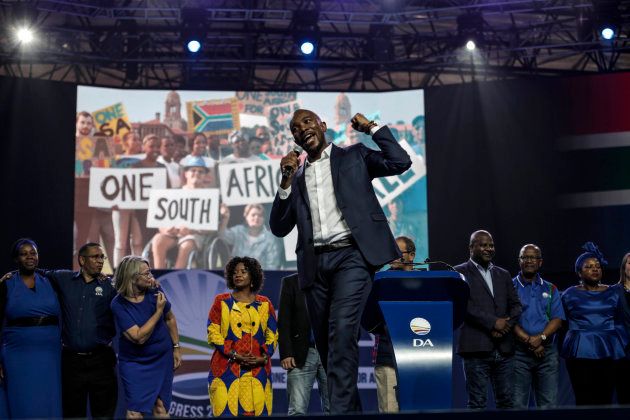 Mmusi Maimane (C), delivers his speech during the DA party congress in Pretoria on April 7, 2018. / AFP PHOTO / GULSHAN KHAN