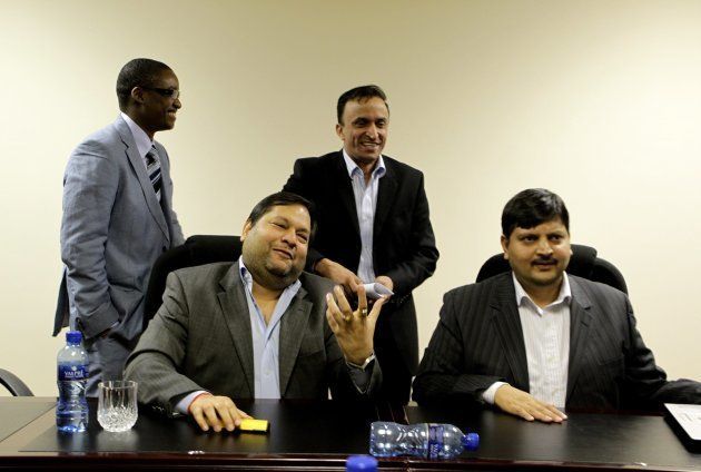 Ajay and Atul Gupta, Duduzane Zuma and Jagdish Parekh (standing) speak to the City Press from the New Age Newspaper's offices in Midrand, Johannesburg, South Africa on 4 March 2011.