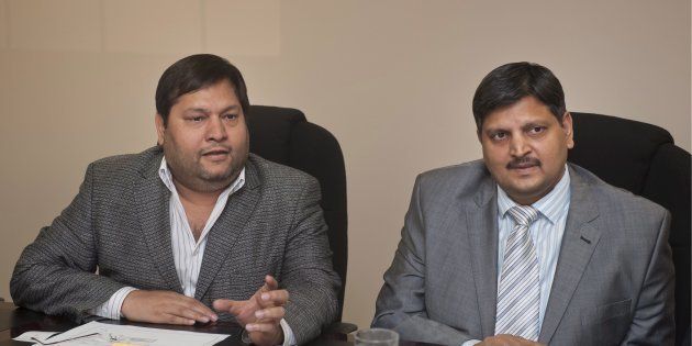 Indian businessmen, Ajay Gupta and younger brother Atul Gupta.