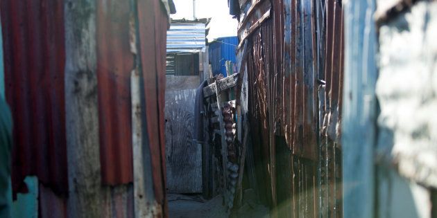 Shacks are seen at an informal settlement near Cape Town, South Africa, September 12, 2016. A process of 'upgrading' enables each shack in an informal settlement to receive basic services of water, electricity Â and sanitation. Picture taken September 12, 2016. Nicky Milne/Thomson Reuters Foundation via REUTERS